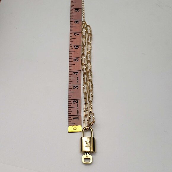 Authentic Louis Vuitton Lock and Key Gold Color with Gold Plated Chain Necklace - Picture 3 of 11